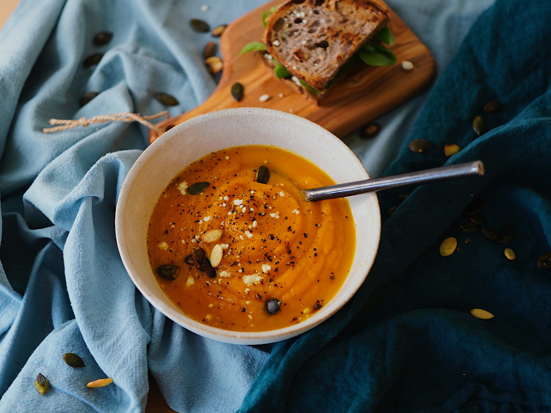 Soup in White Bowl With Bread