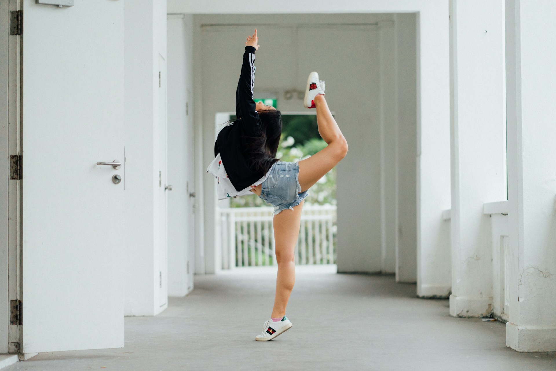 Woman Dancing in Hallway