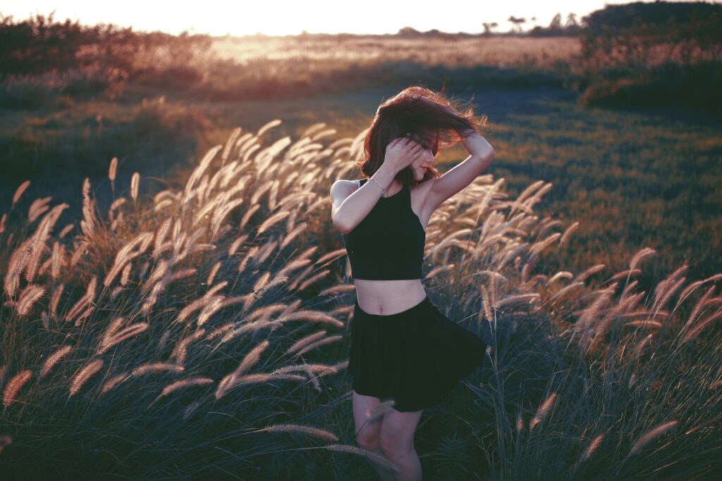 Woman Dancing in Field