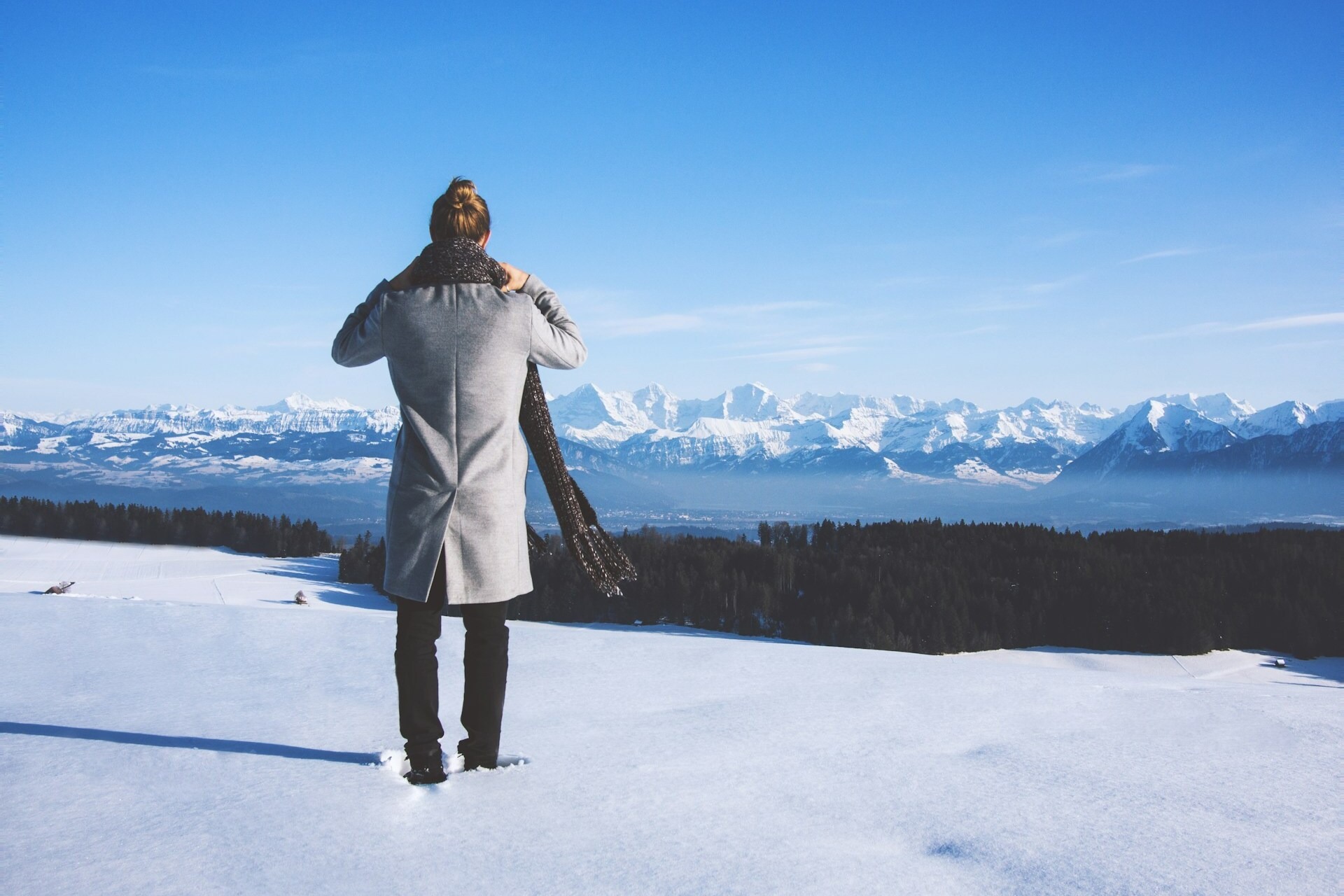 a person alone on a snowy mountain