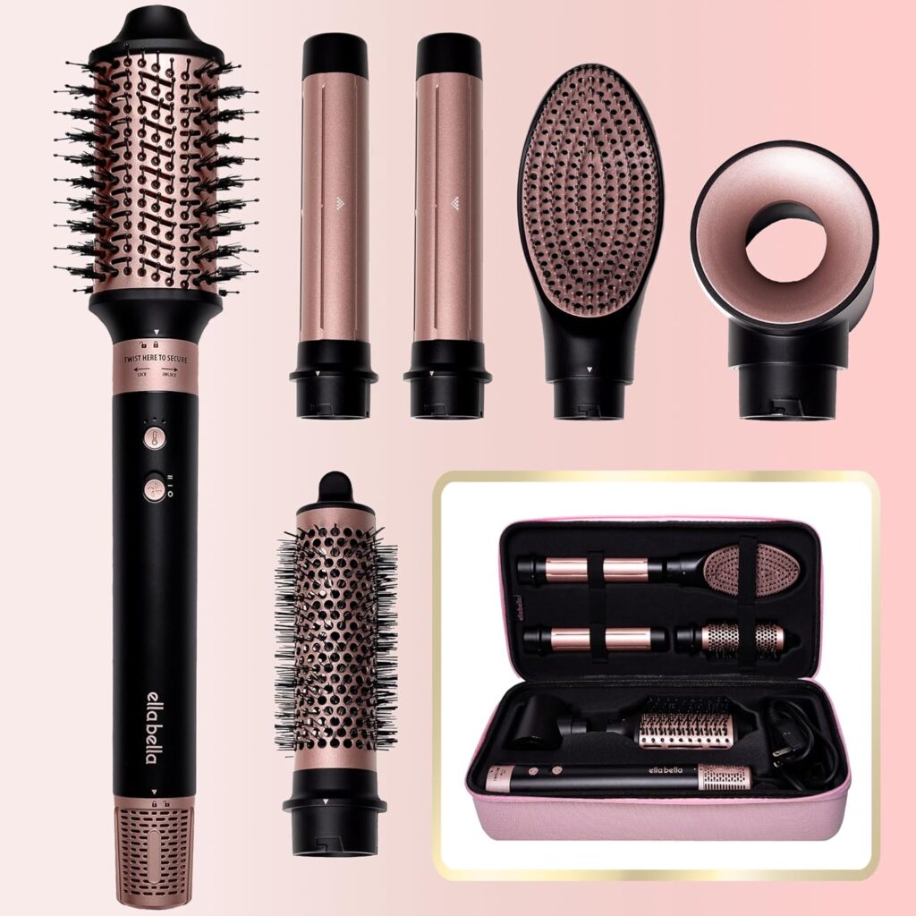 The Ella Bella Hot Air Styler Kit sits open. The multiple attachments lie against a pink background.