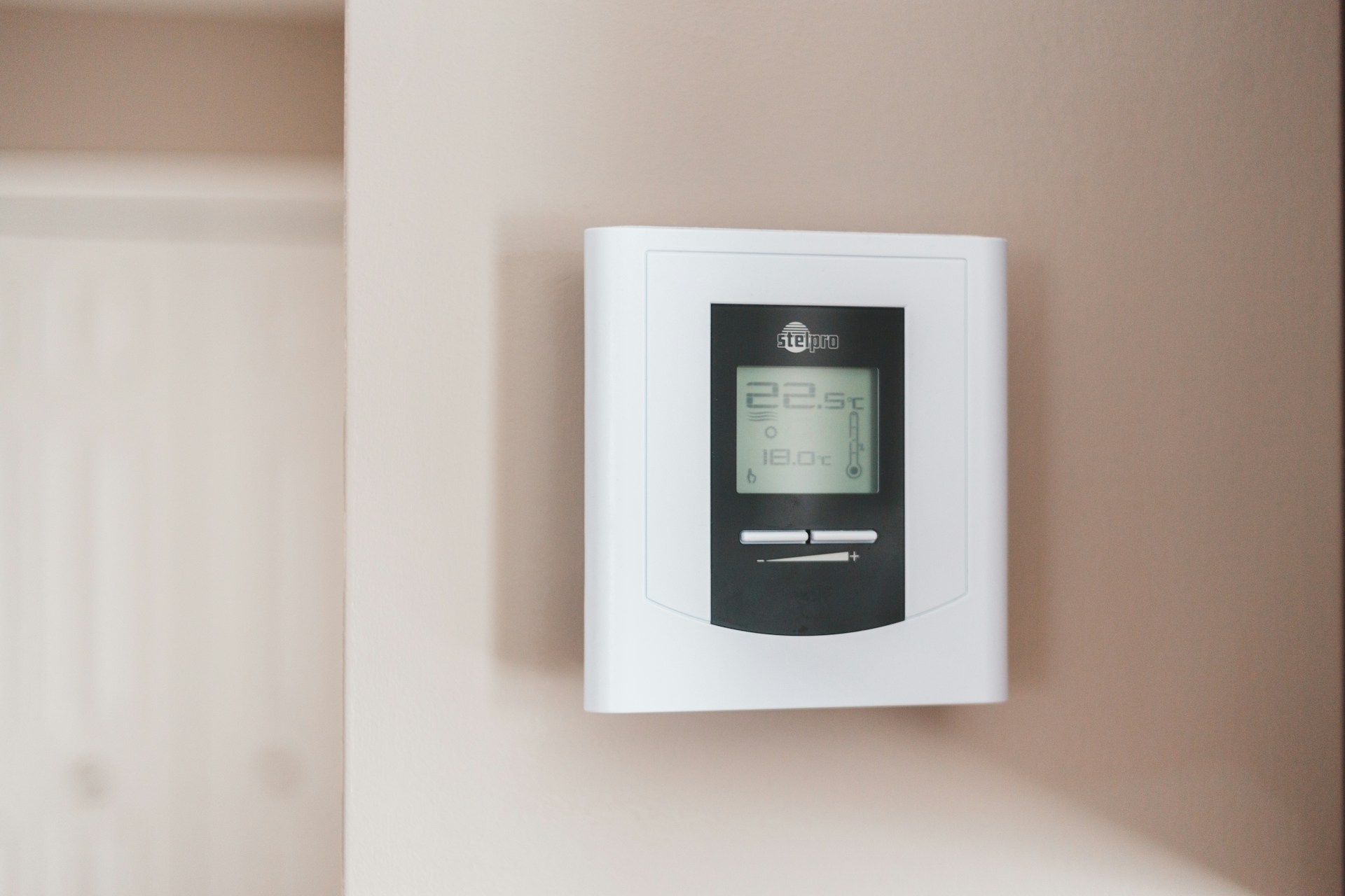 A Smart Thermostat on a wall