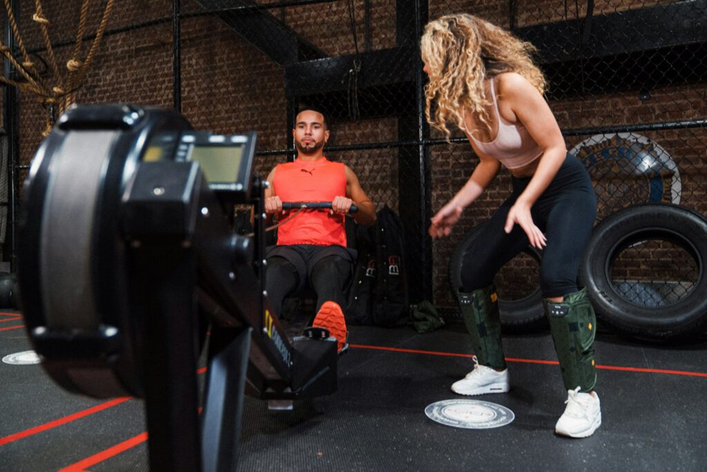 A man on the row machine.