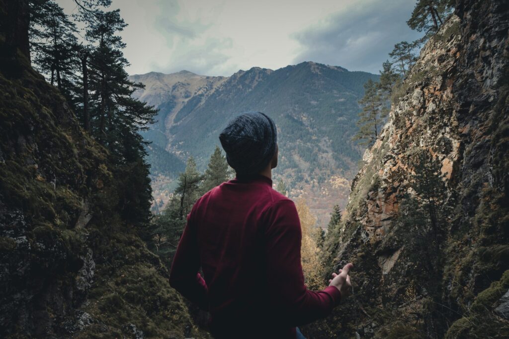 A man relaxing by spending time outside.