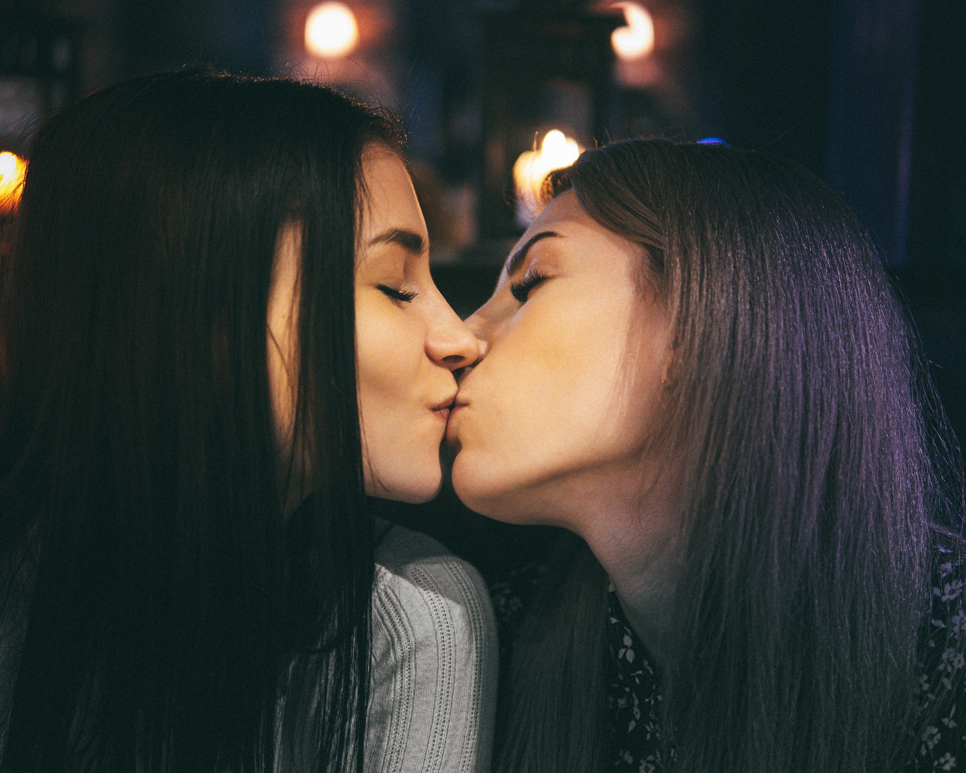 two girls kissing