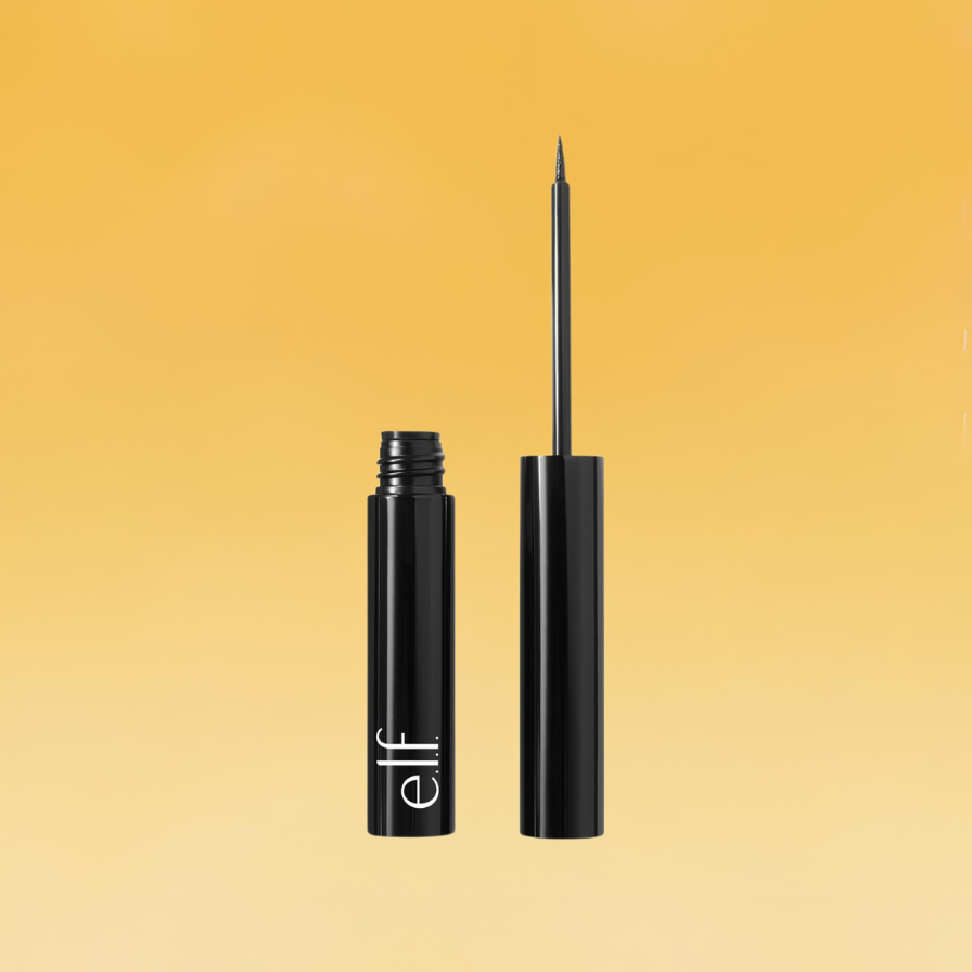 A small black container of e.l.f.'s liquid eyeliner sits against the yellow Body+Mind background. It's open with the tube on the left and the handle brush on the right.
