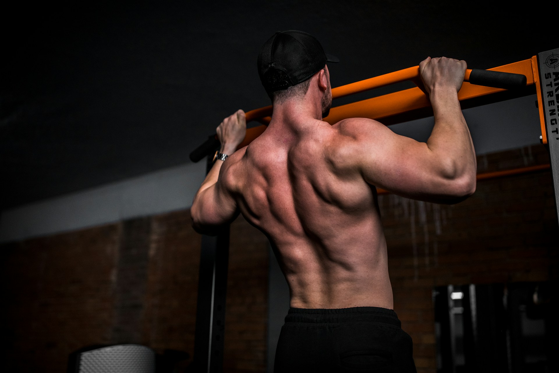 A man doing a pull-up.