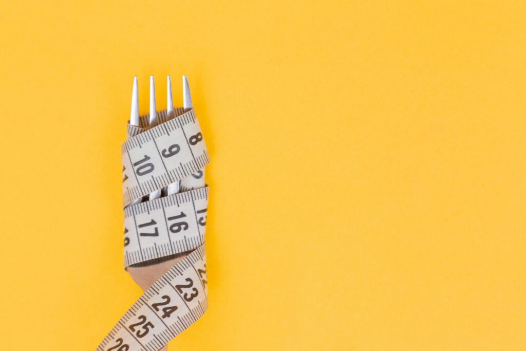 A fork and a measuring tape.