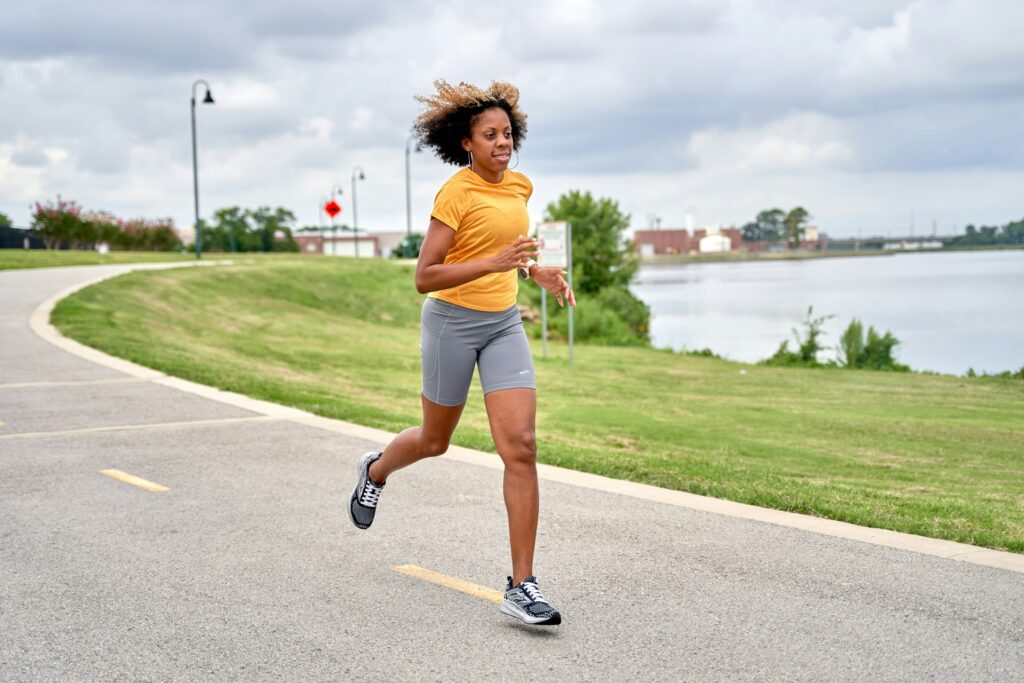 Woman running on a road