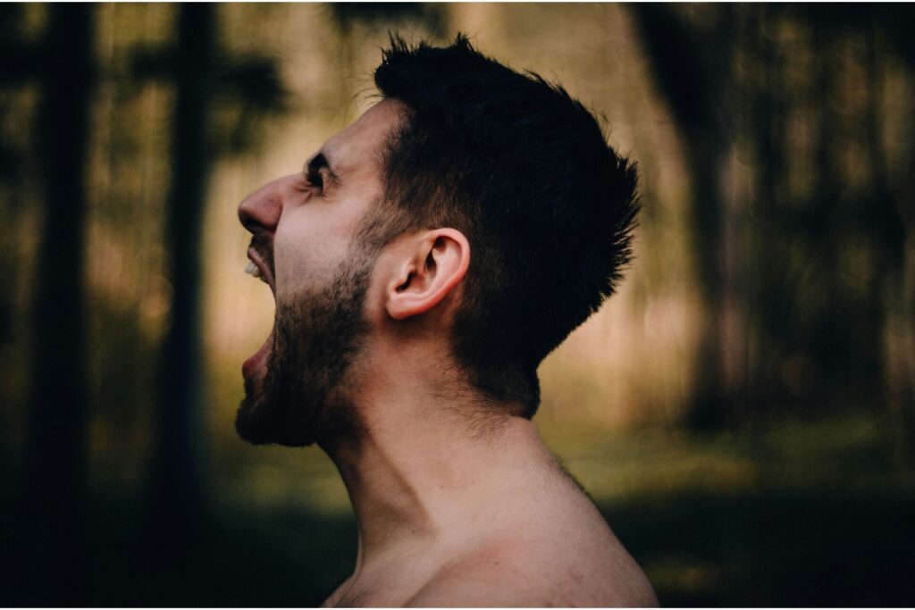 A man screaming