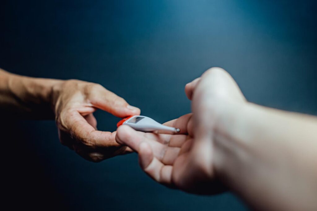 hands passing gray and red test