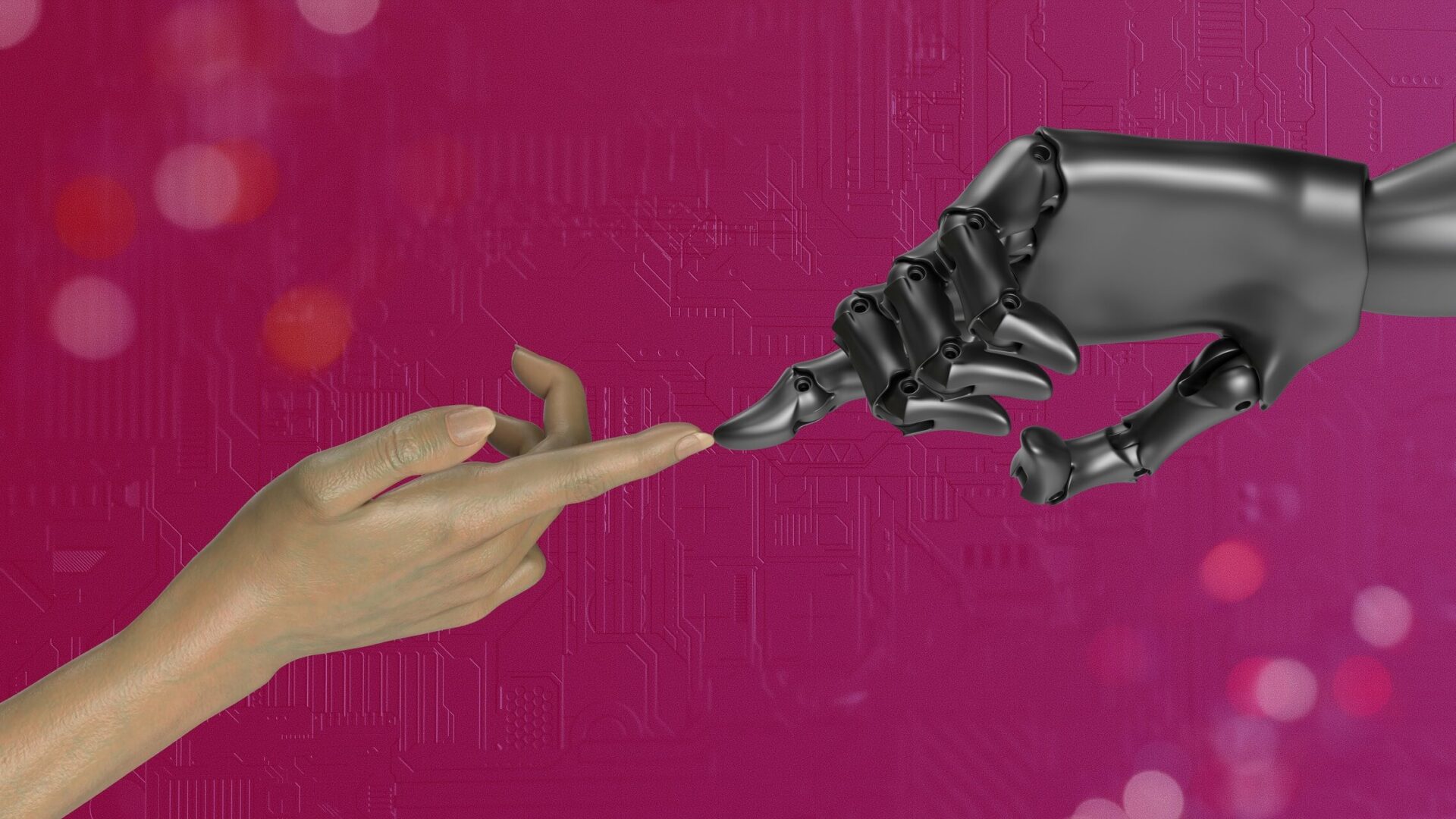 A human hand and a robot hand reaching for one another