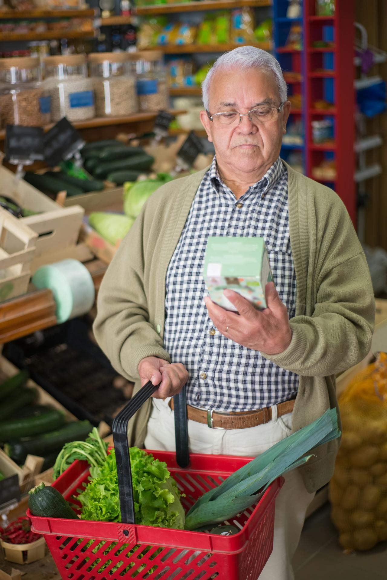 Elderly Man looking at a Product