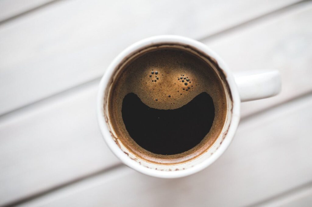 happy coffee in coffee mug