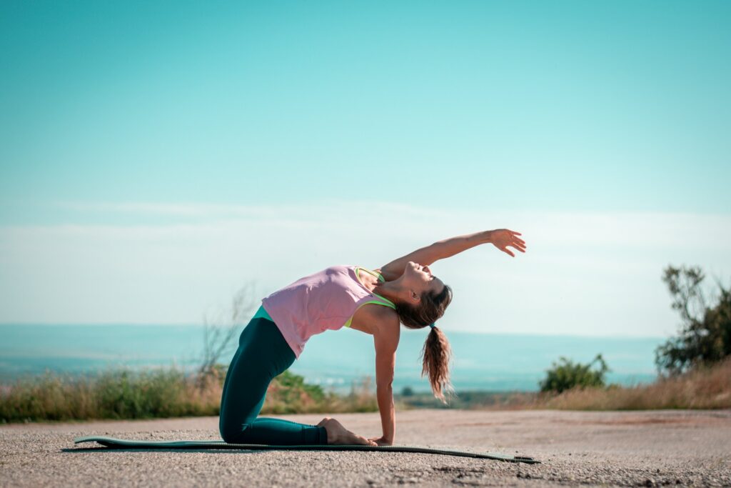 A woman stretching outdoors
