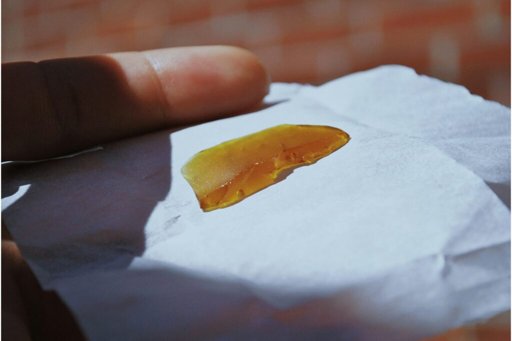 A piece of sugar wax on paper