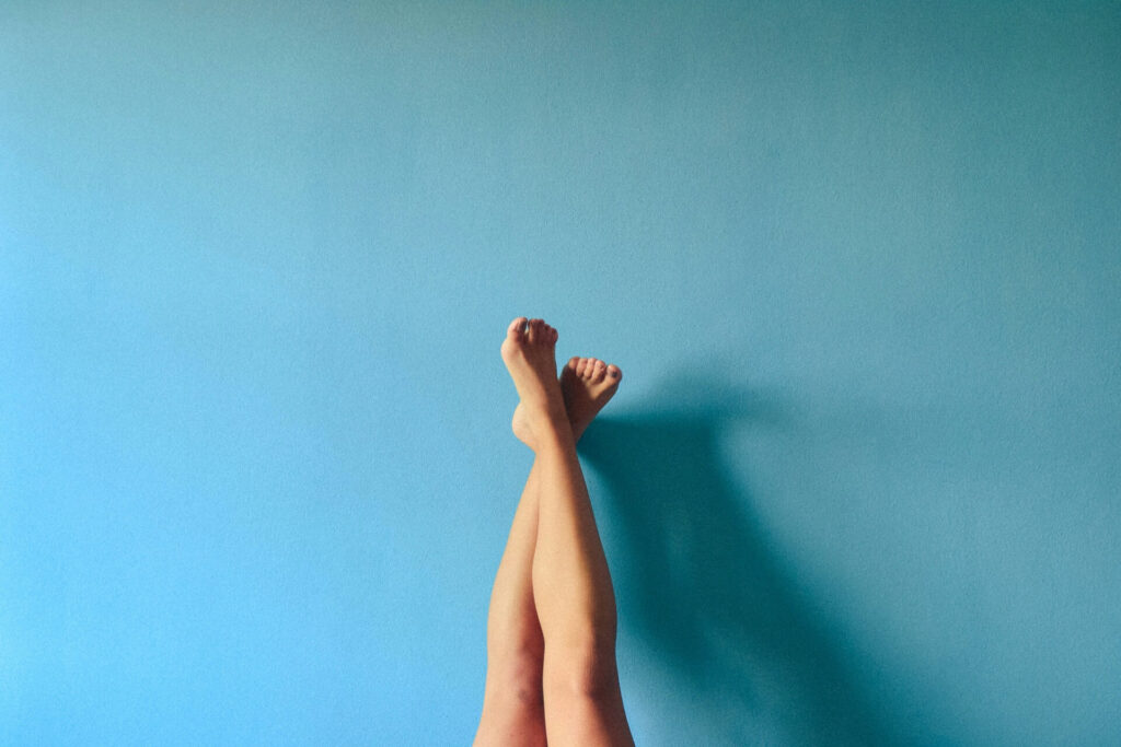 Two legs on a blue background