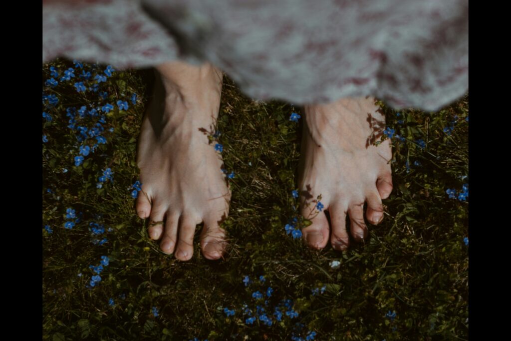 photo of a bare foot on the ground