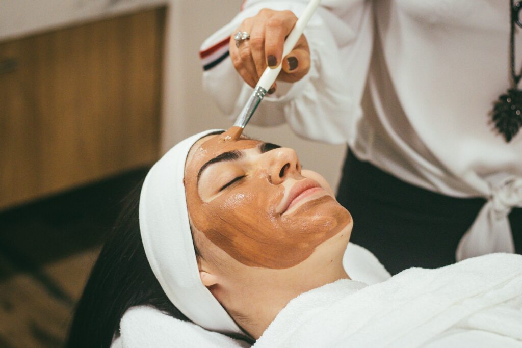 A woman getting a facial.